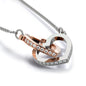 Interlocked Hearts 18k Rose Gold and Steel with CZ Accents